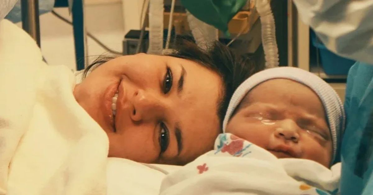 mom and baby post cesarean in OR