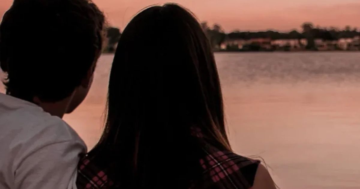 couple looking at lake