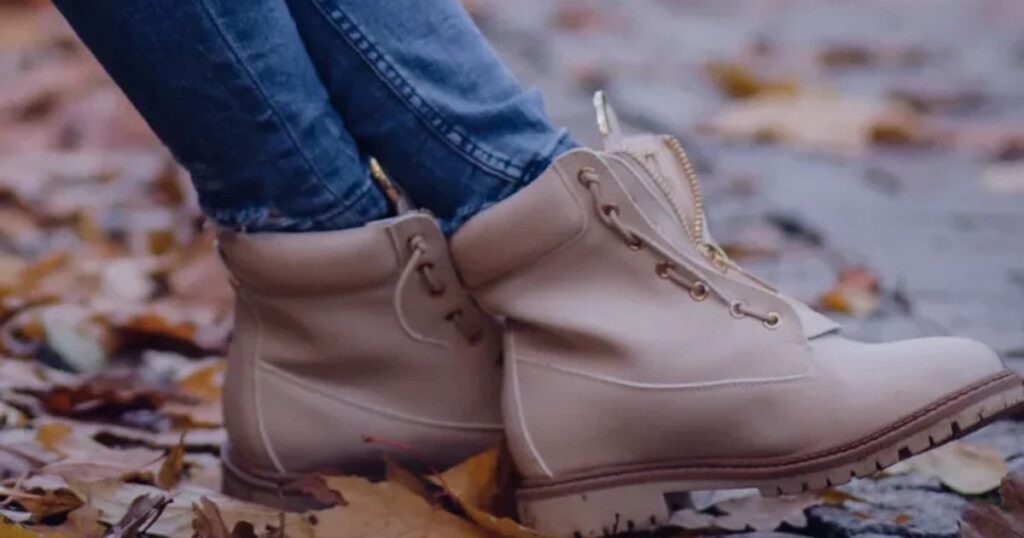 woman in boots in the fall